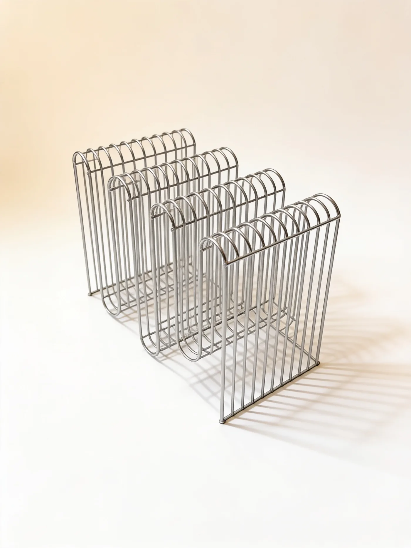 Magazine Rack Curves — מגזינים מנירוסטה